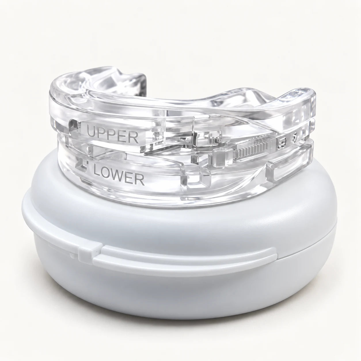 Boquilla transparente Symbiosmile sobre su estuche blanco